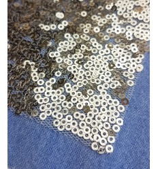 Thermocollant paillette bouche-trou