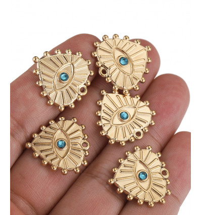 Pendentif coeur avec oeil gravé