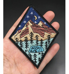 Ecusson montagne dans un losange